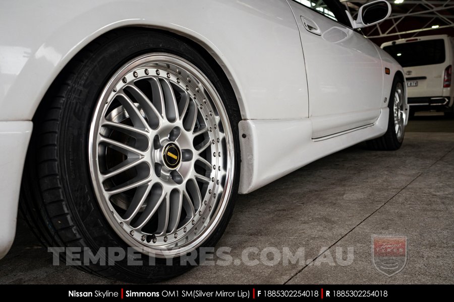 18x8.5 Simmons OM-1 Silver on Nissan Skyline