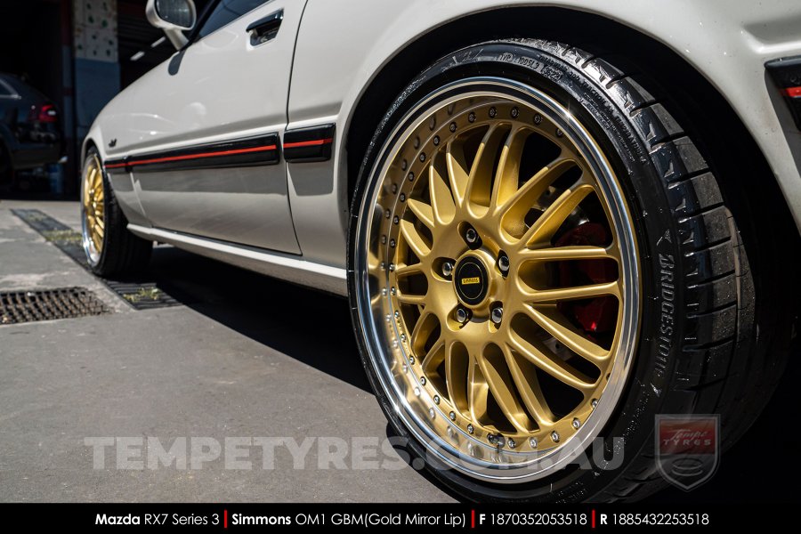 18x7.0 18x8.5 Simmons OM-1 Gold on Mazda RX7