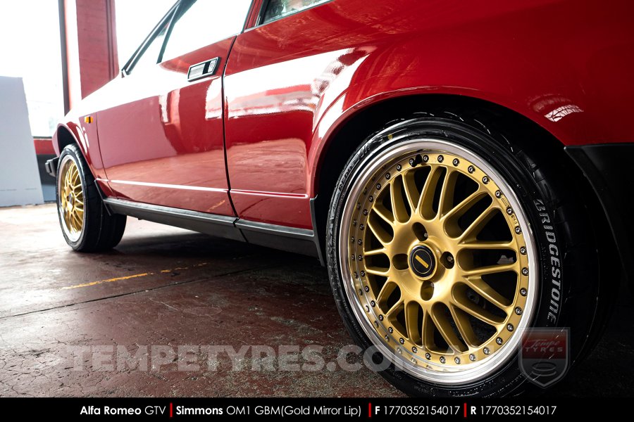 17x7.0 17x8.5 Simmons OM-1 Gold on Alfa Romeo GTV