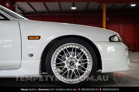 18x8.5 Simmons OM-1 Silver on Nissan Skyline