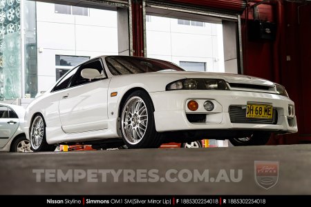 18x8.5 Simmons OM-1 Silver on Nissan Skyline